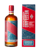 Eine Flasche Garryana Whiskey steht neben einer rot-blauen Verpackung, die die 5. Edition des amerikanischen Single Malt anzeigt.