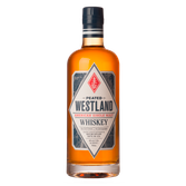 Eine Flasche Westland Peated American Single Malt Whiskey mit einem auffälligen Etikett und einem warmen, bernsteinfarbenen Getränk.