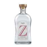 Eine elegante Flasche mit dem Aufdruck 'Z' und dem Etikett 'Waldhimbeer', die einen klaren Geist präsentiert.