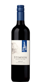 Die Flasche zeigt ein stilvolles Design mit einer Zeichnung eines Hauses und einem blauen Baum-Logo auf dem Etikett.