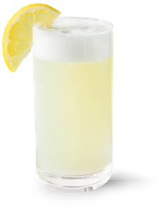 Ein erfrischendes Glas mit einem hellgelben Getränk, gekrönt von einer Schicht Schaum und einer Zitronenscheibe am Rand.
