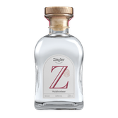 Ein klarer Geist in einer ansprechenden Flasche, die mit einem auffälligen 'Z' und dem Hinweis auf Waldhimbeeren verziert ist.
