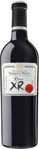 Eine elegante Flasche Rotwein mit einem kunstvollen Etikett, das den Namen 'Reserva XR' trägt und in einem dunklen Hintergrund steht.