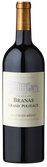 Eine elegante Flasche Château Branas Grand Poujeaux aus Moulis-en-Médoc, mit einem goldenen Korken und einem stilvollen Etikett.