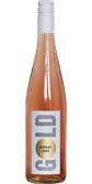 Eine Flasche Muskat Rosé mit einem eleganten, schimmernden Etikett und einem goldenen Aufkleber, die im Licht glänzt.