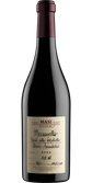 Eine elegante Flasche Rotwein mit einem tiefen, dunklen Etikett und handschriftlichen Details über die Herkunft und den Jahrgang.