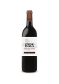 Eine elegante Flasche Rotwein mit dem Etikett 'Condado de Haza', Jahrgang 2016, vor einem schlichten Hintergrund.