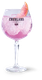 Ein elegantes Glas mit pinkem Getränk, das mit Sprudel gefüllt ist, und einer Scheibe Grapefruit am Rand.