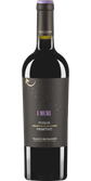 Die Flasche zeigt den Weinnamen 'Primitivo' und die Herkunft 'Puglia', umgeben von einem stilvollen Design.