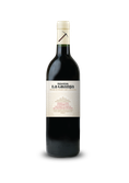 Eine elegante Flasche Rotwein mit einem weißen Etikett, das den Namen 'Dehesa La Granja' trägt und eine Geschichte erzählt.