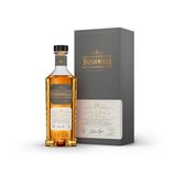 Eine Flasche Bushmills 21 Jahre alter Single Malt Whiskey steht elegant vor einer stilvollen Verpackung.